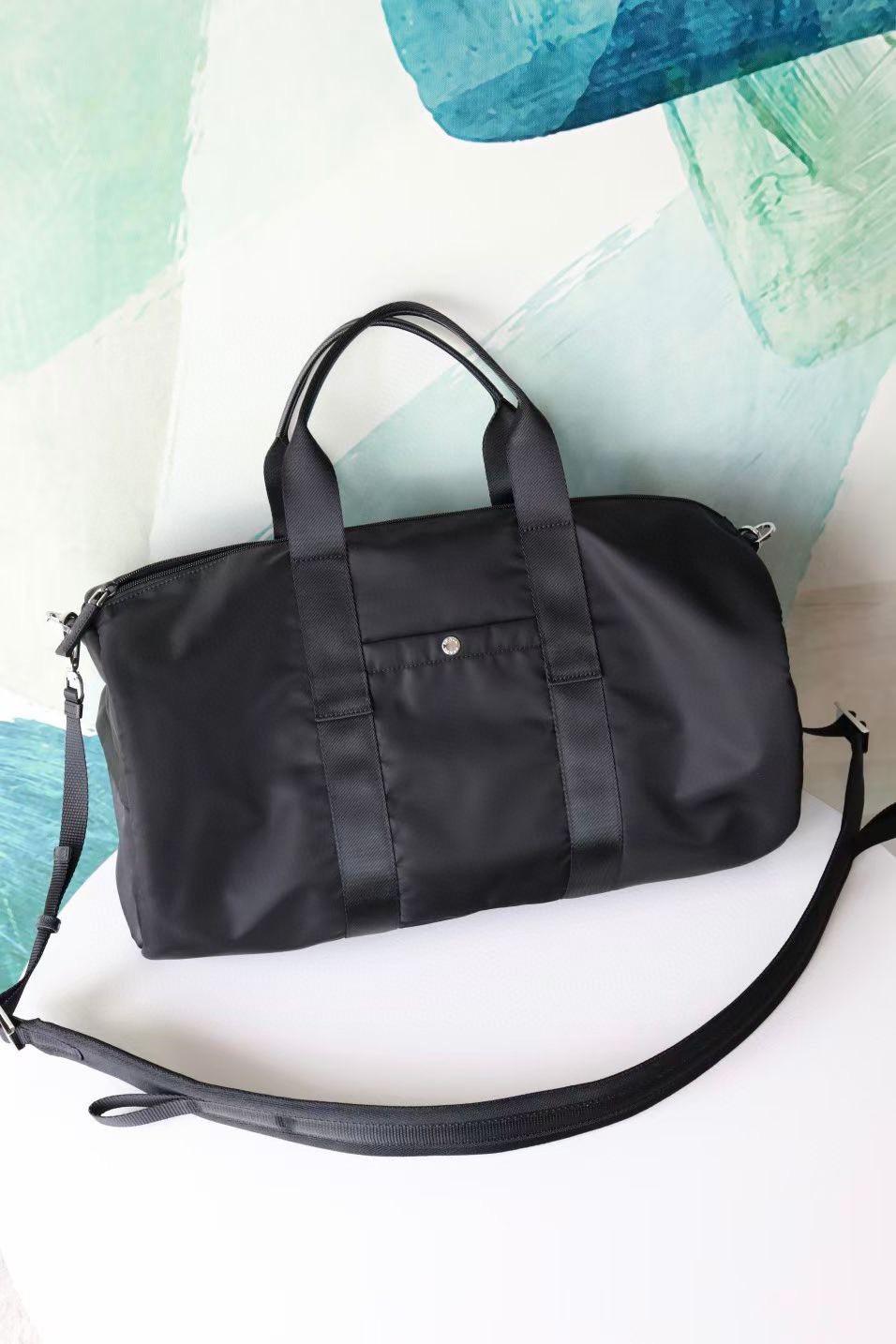 Pra*a travel bag-50*25*25cm