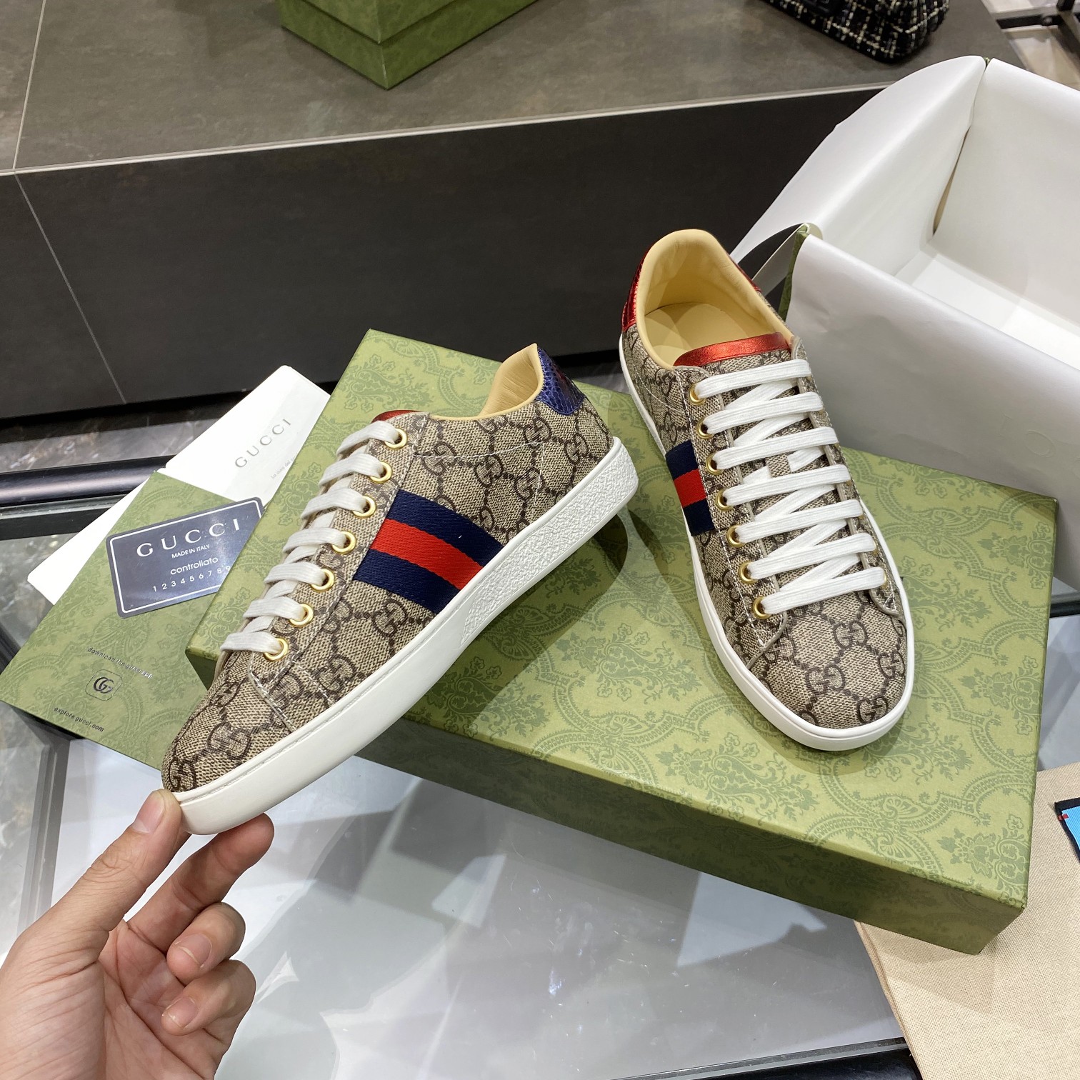 G*u*i sneakers