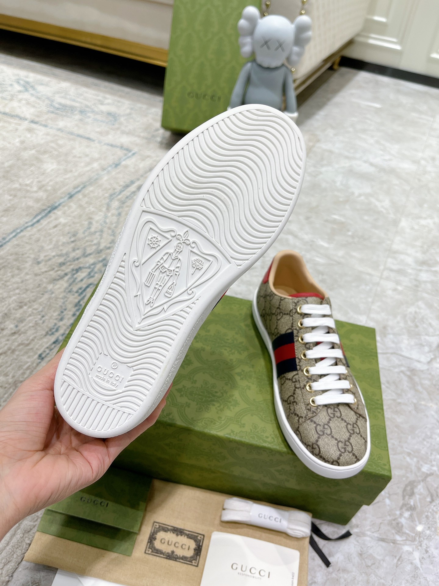 G*u*i sneakers