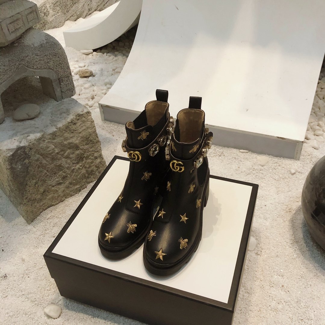 G*u*i boots