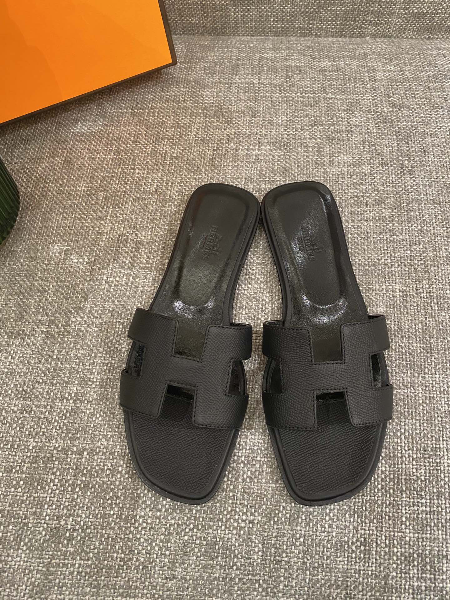 H**mes slippers in caviar leather