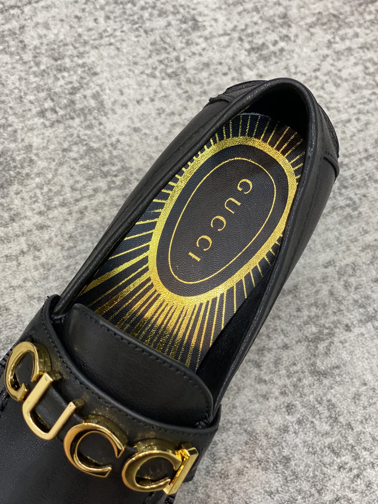 G*u*i loafers