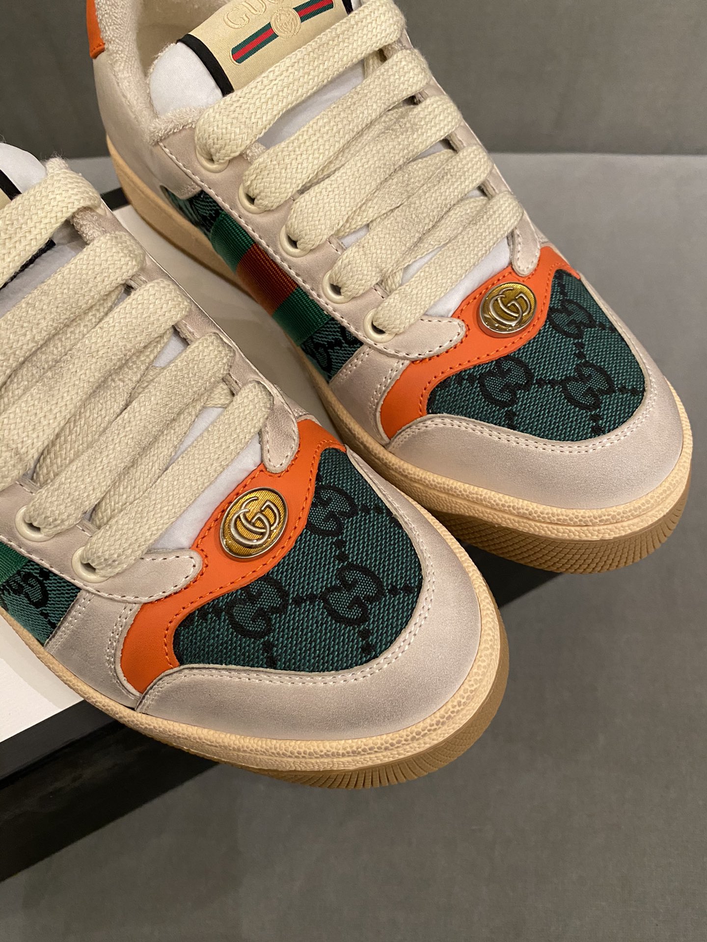 G*u*i sneakers