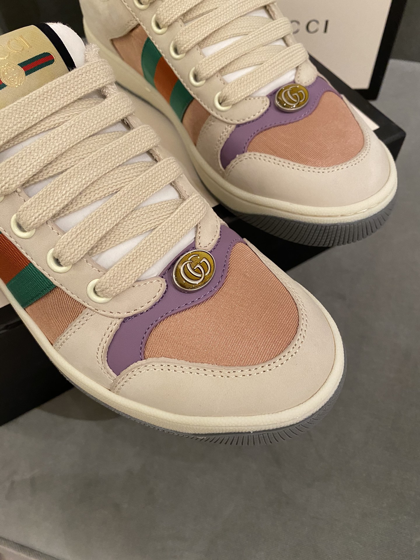 G*u*i sneakers
