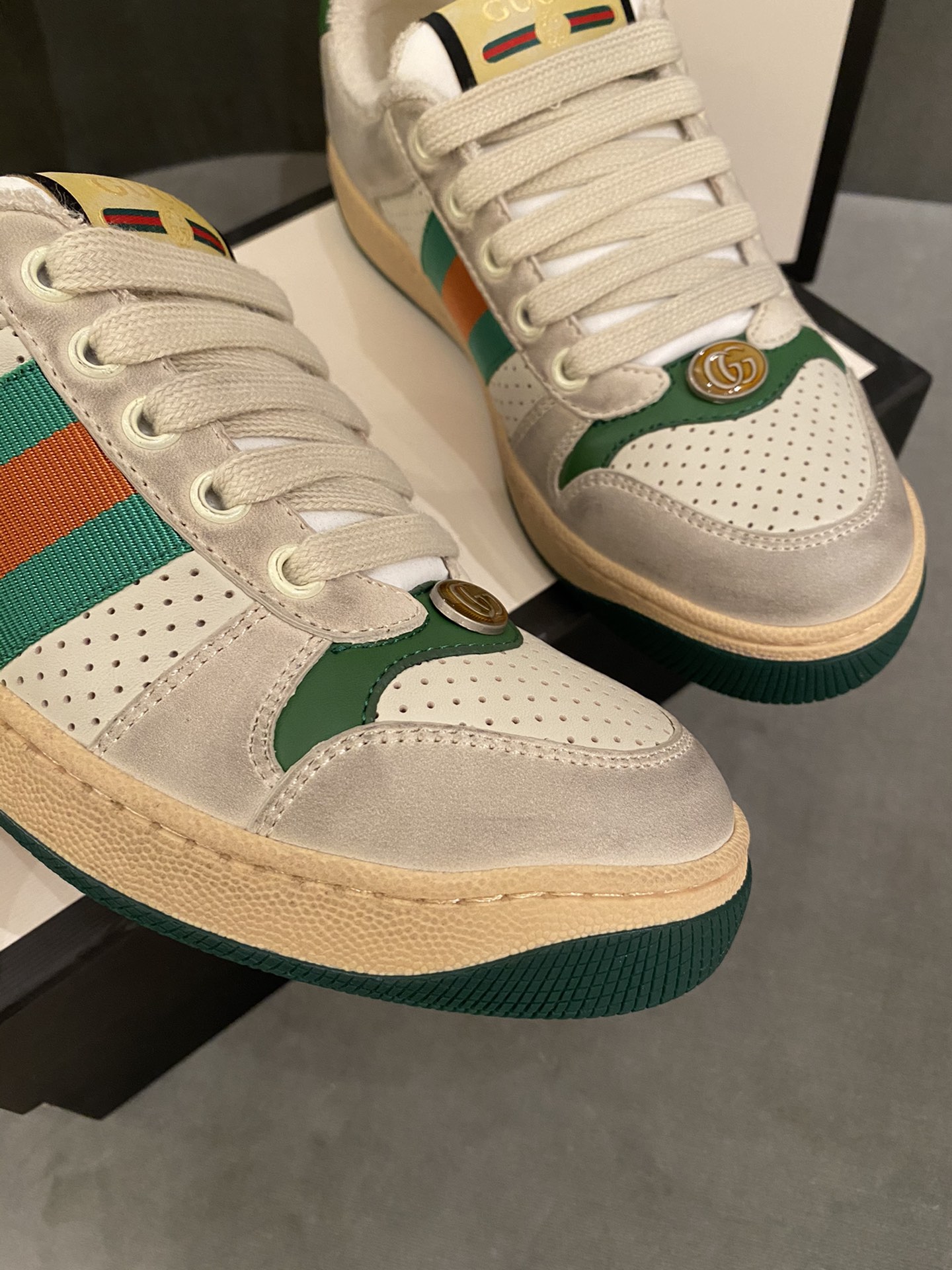 G*u*i sneakers