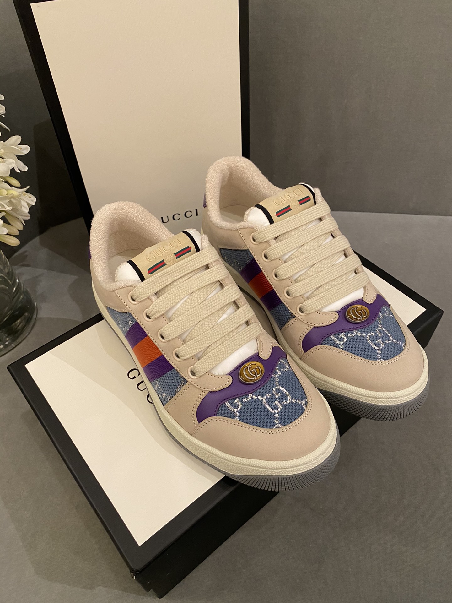G*u*i sneakers