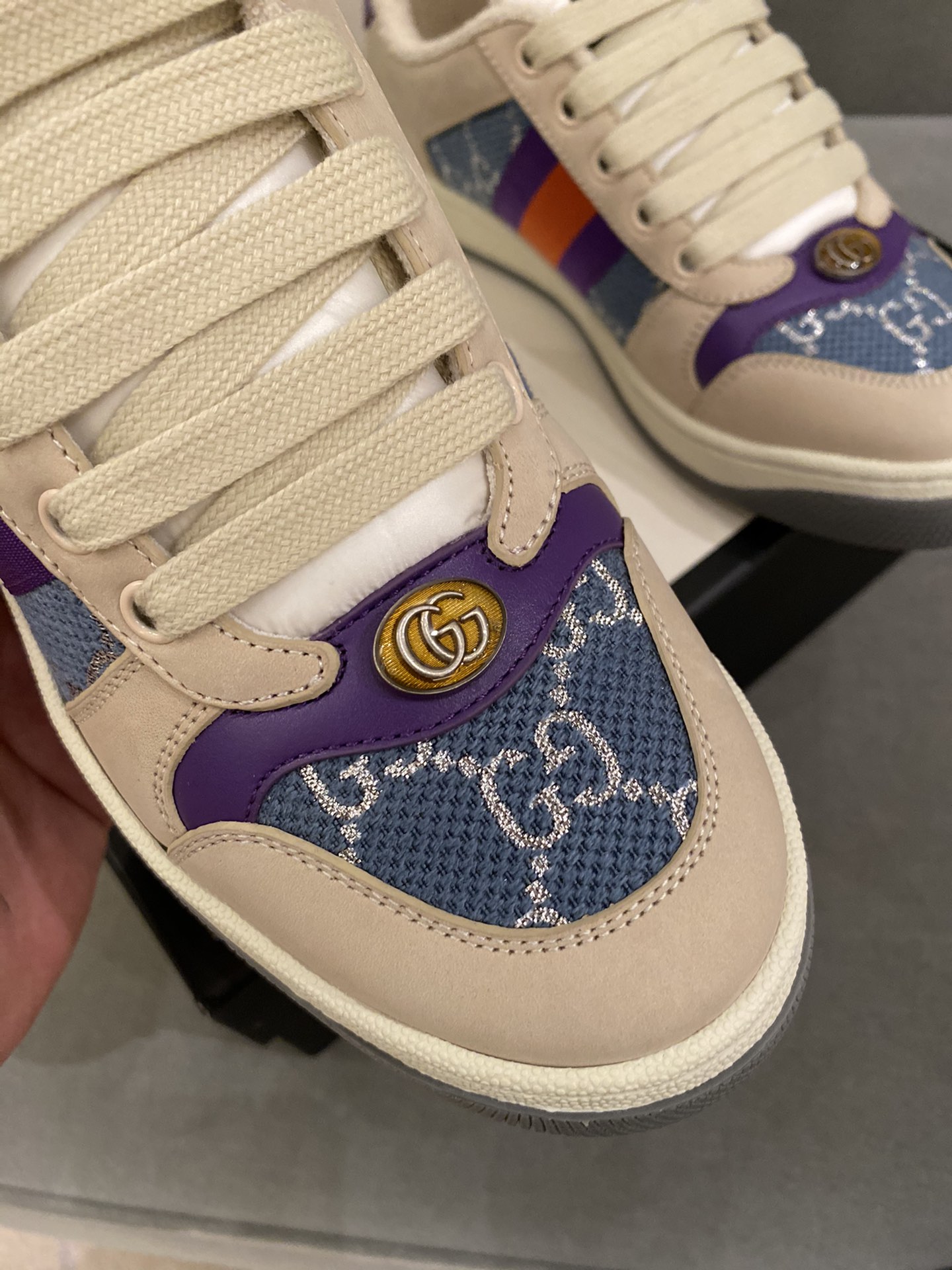 G*u*i sneakers