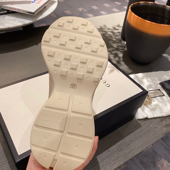 G*u*i sneakers