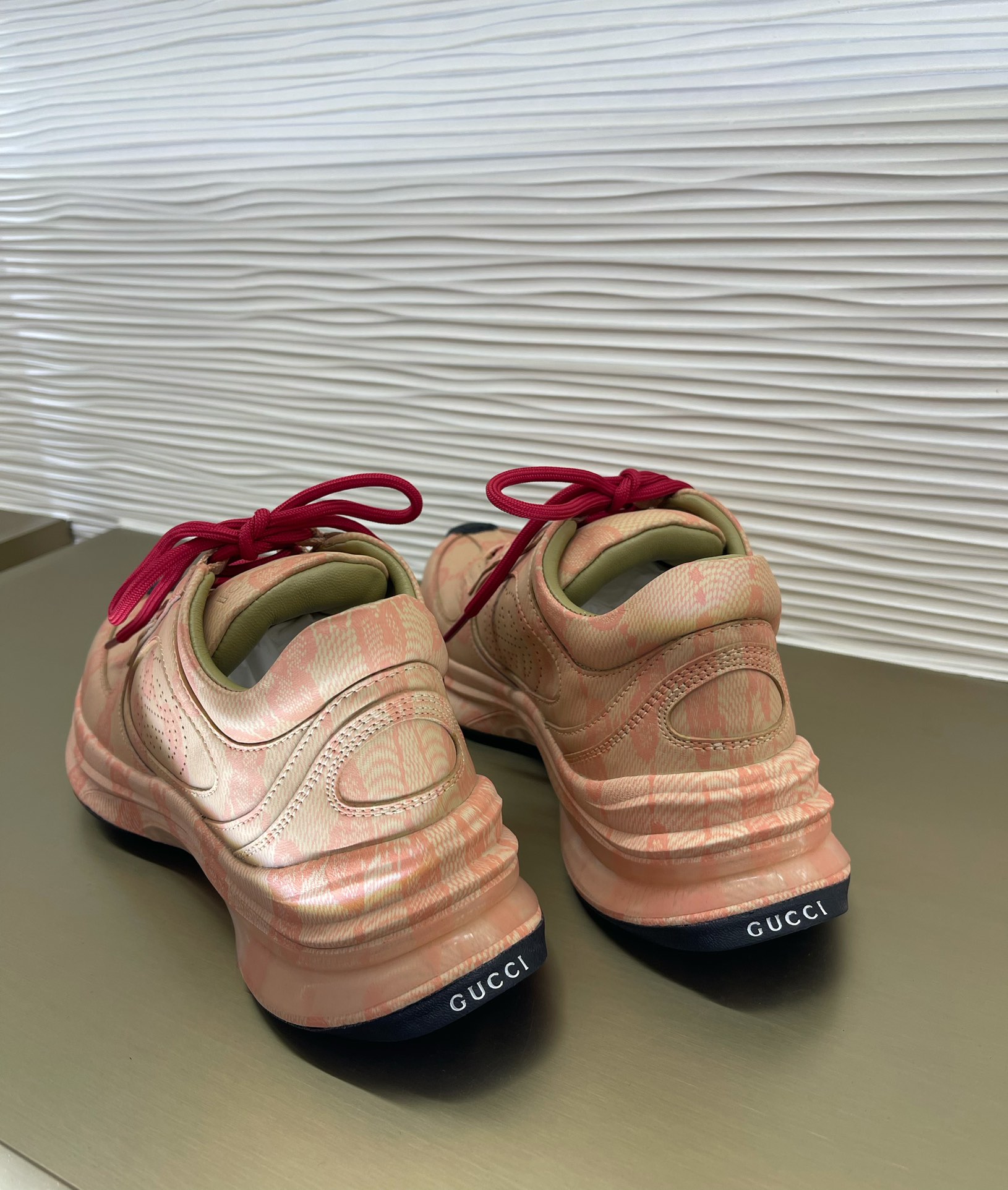 G*u*i sneakers