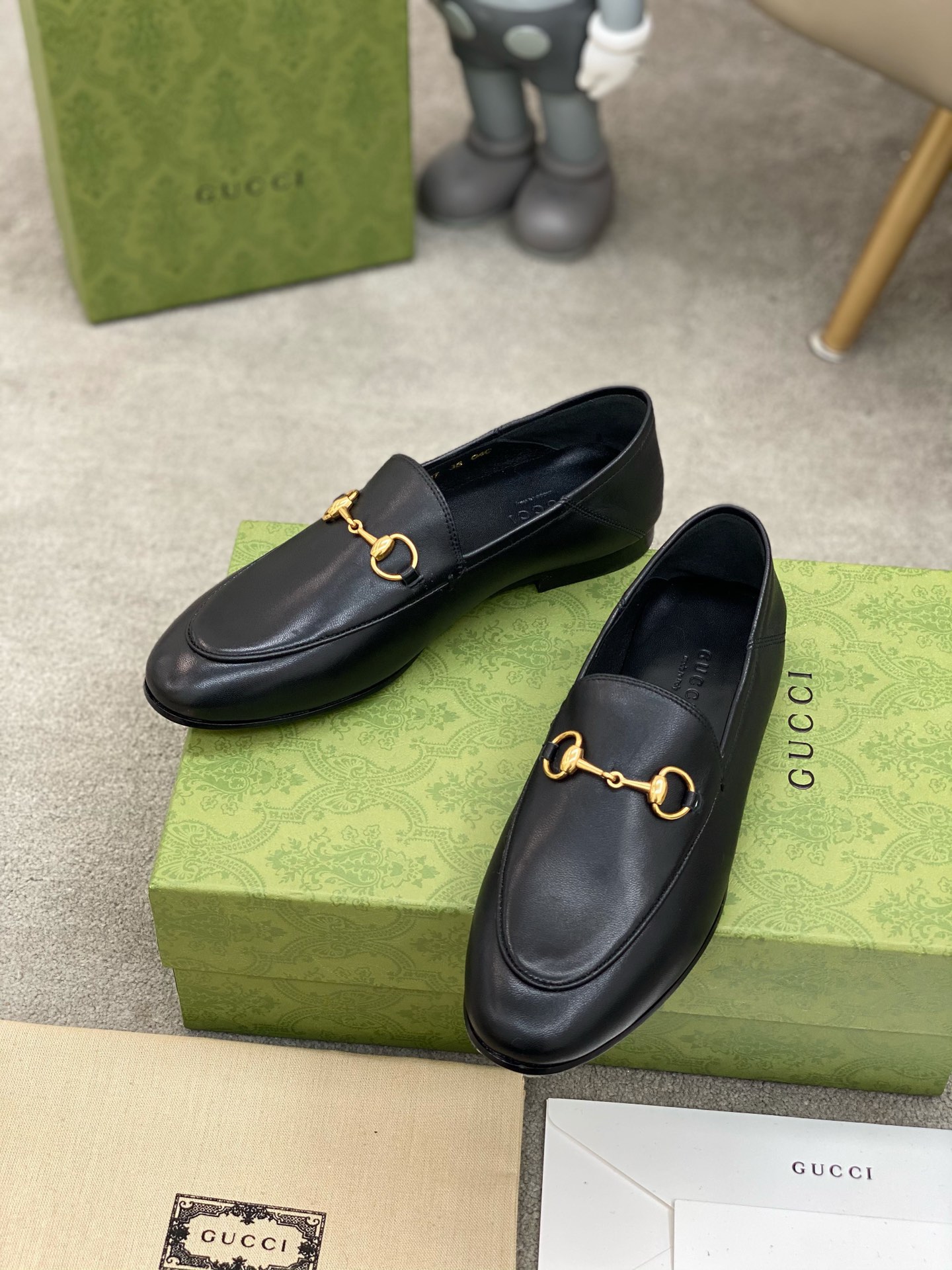 G*u*i loafers