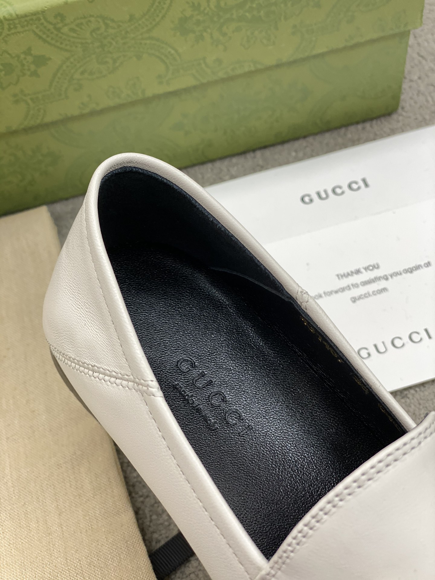 G*u*i loafers