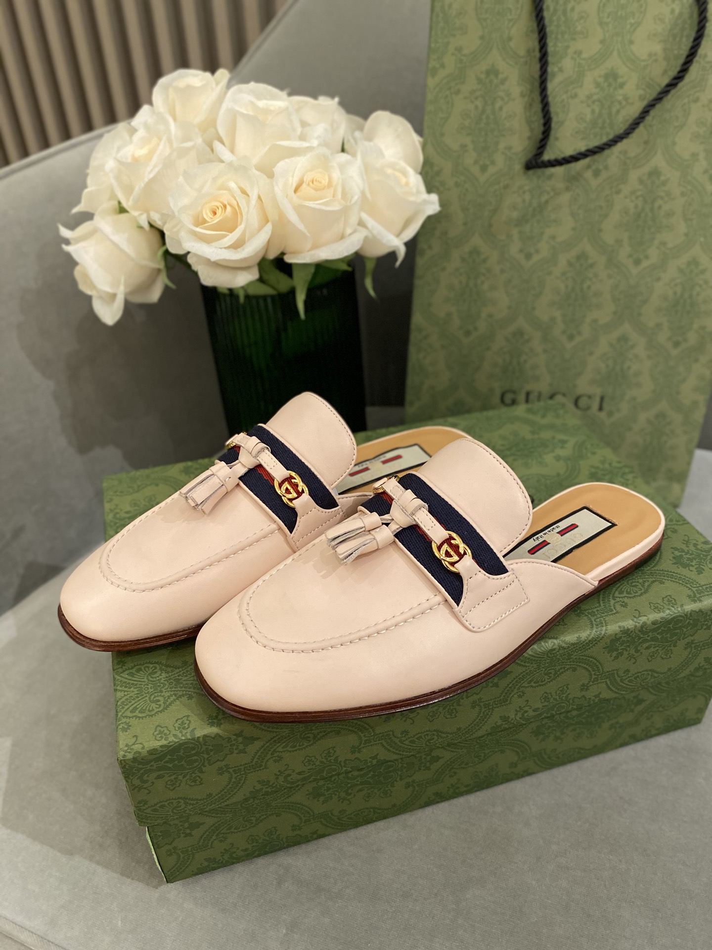 G*u*i loafers